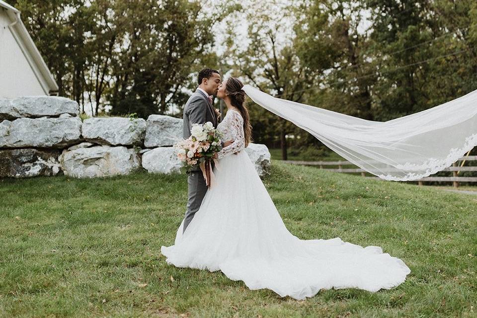 Kissing in a flowing dress