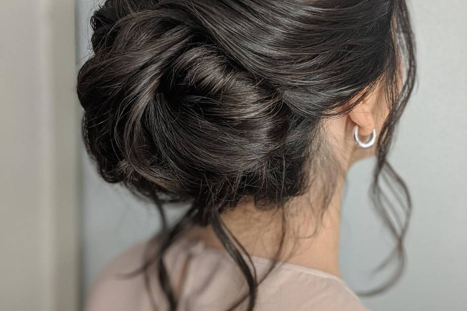 Soft low updo