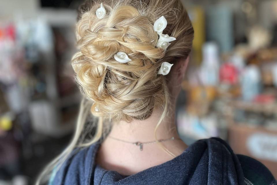 Braided updo w/ floral add-ons
