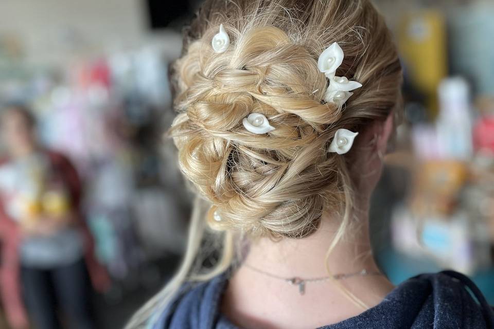 Braided updo w/ floral add-ons