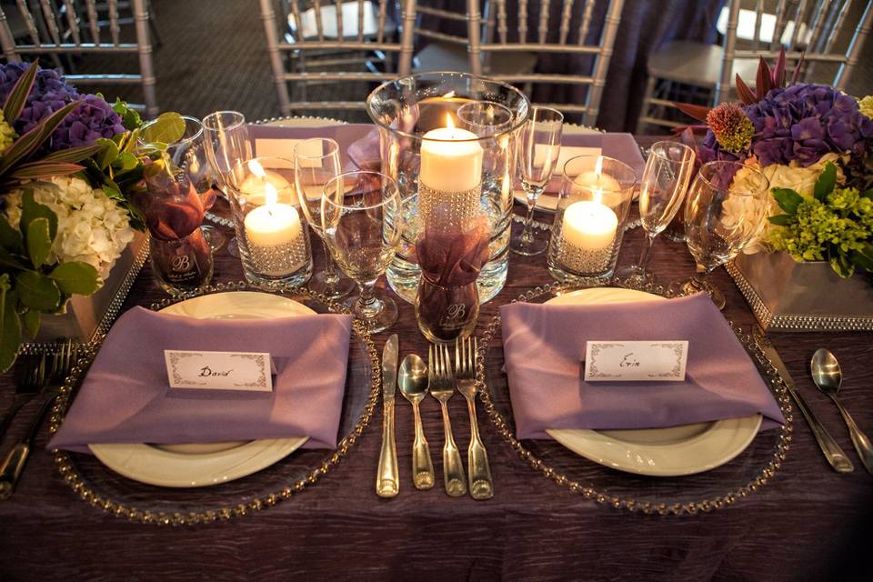 Table numbers and and matching booklet for guest to put their good wishes and advice for the couple. Anniversary book coincides with the guest table.