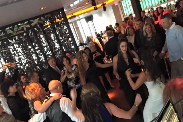Couple and guest dancing