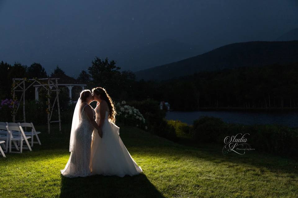 Brides Kissing