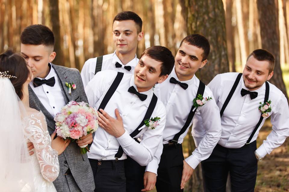 Groomsmen with bride