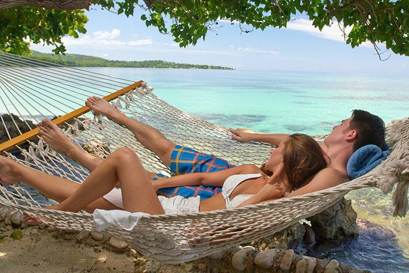 Ahhh, a beach-side hammock is a chance to unwind.