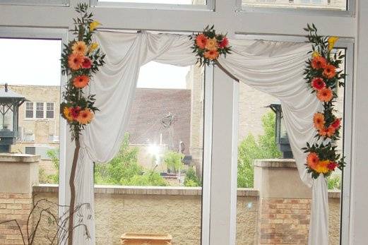 This arch was decorated with gerbera daisies.