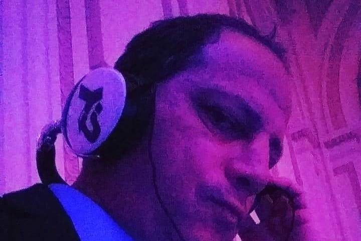 DJ DRESSED IN SUIT
