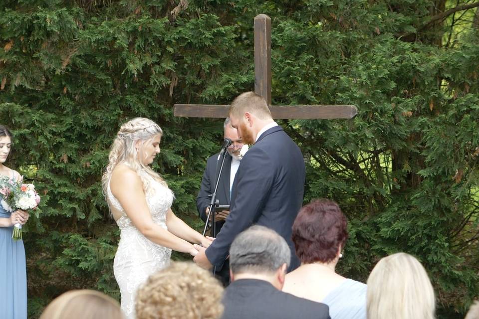 Bride and Groom at altar