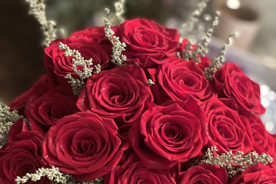 Long-stem roses and white sage