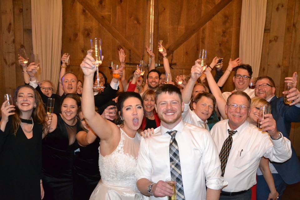 Group photo with wine toast