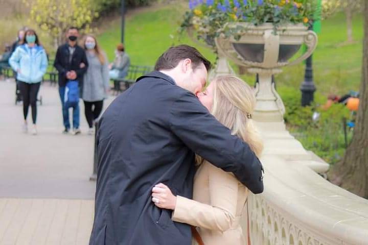 First kiss as to-be-weds - Photo by Emilie Alpert