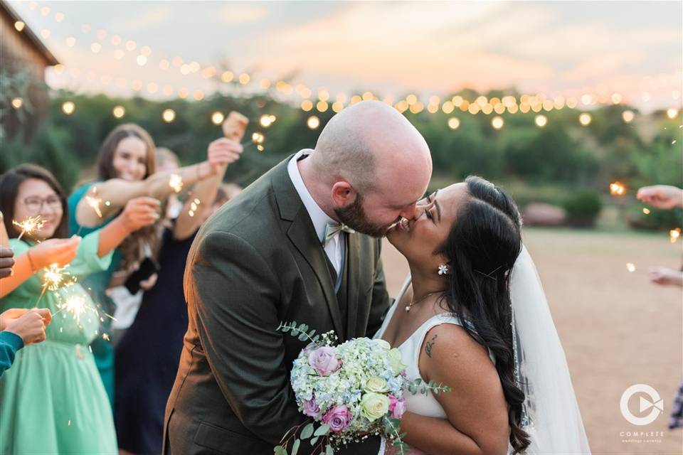 Rodora and Logan share a kiss