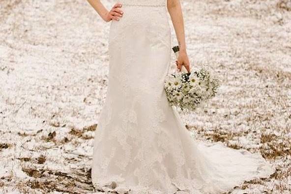 Bride in a sleeveless lace dress