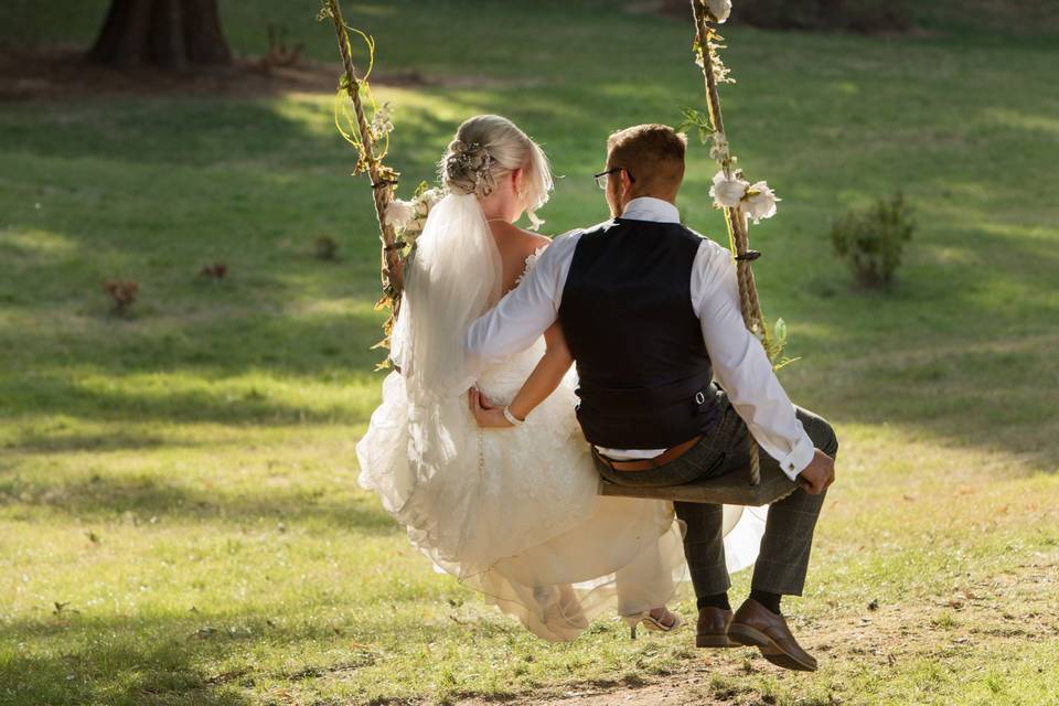 Wedding Coiuple on Swing
