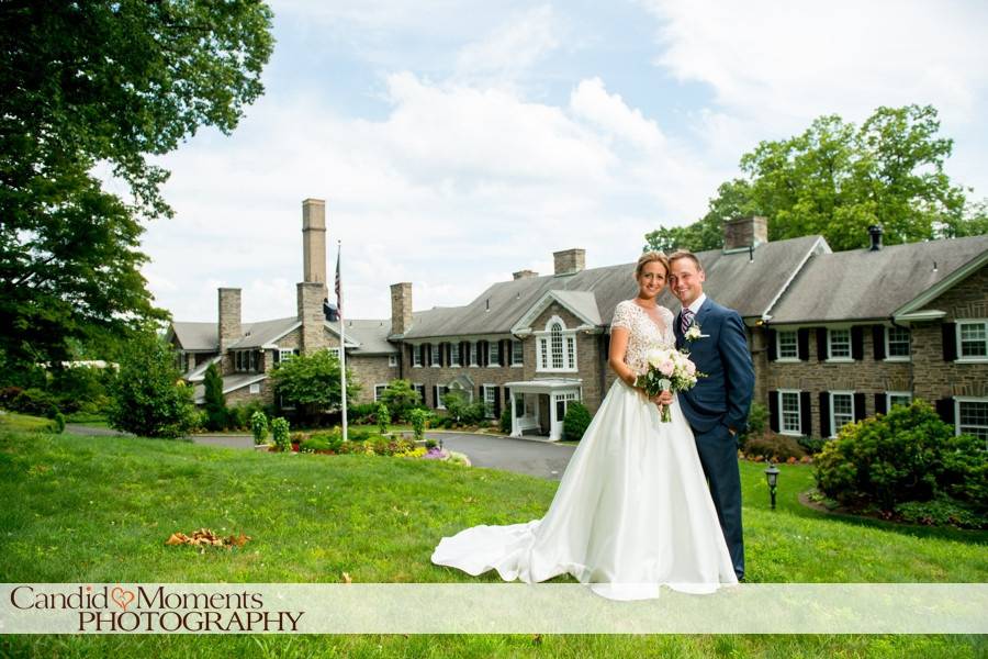 Couple in front of clubhouse