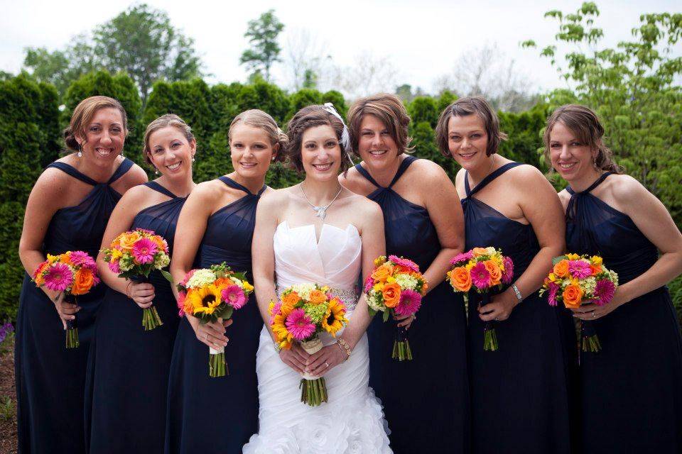 Bride and her bridesmaids' colorful bouquets