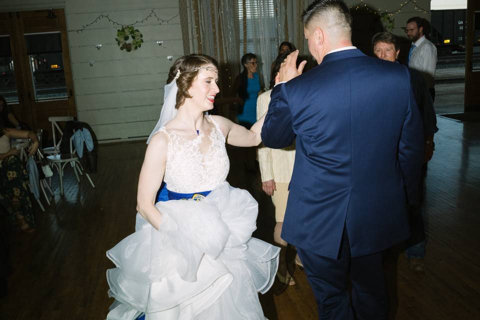 Blue wedding dress sash - Andy Woodward Photography