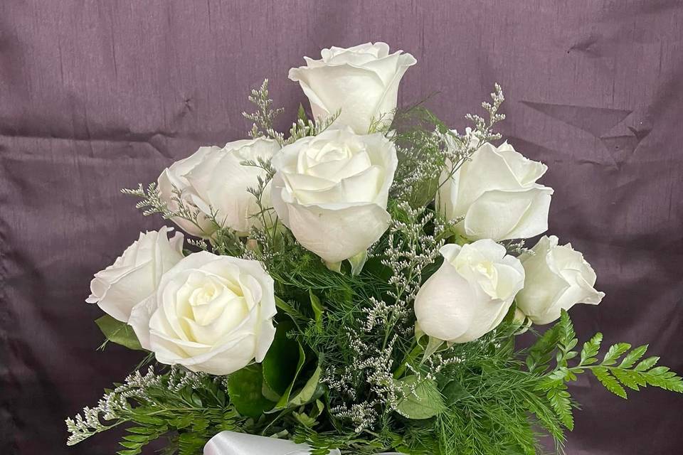 Lovely roses with white ribbon