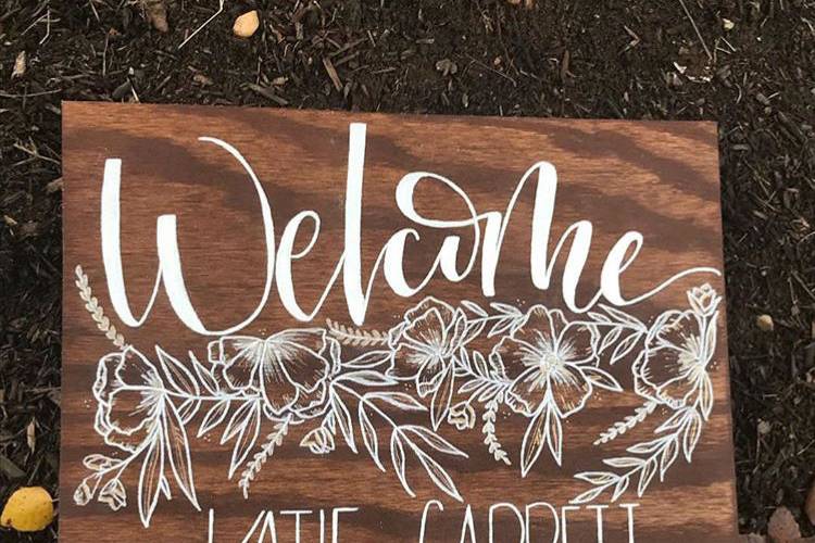 Welcome wood sign with florals