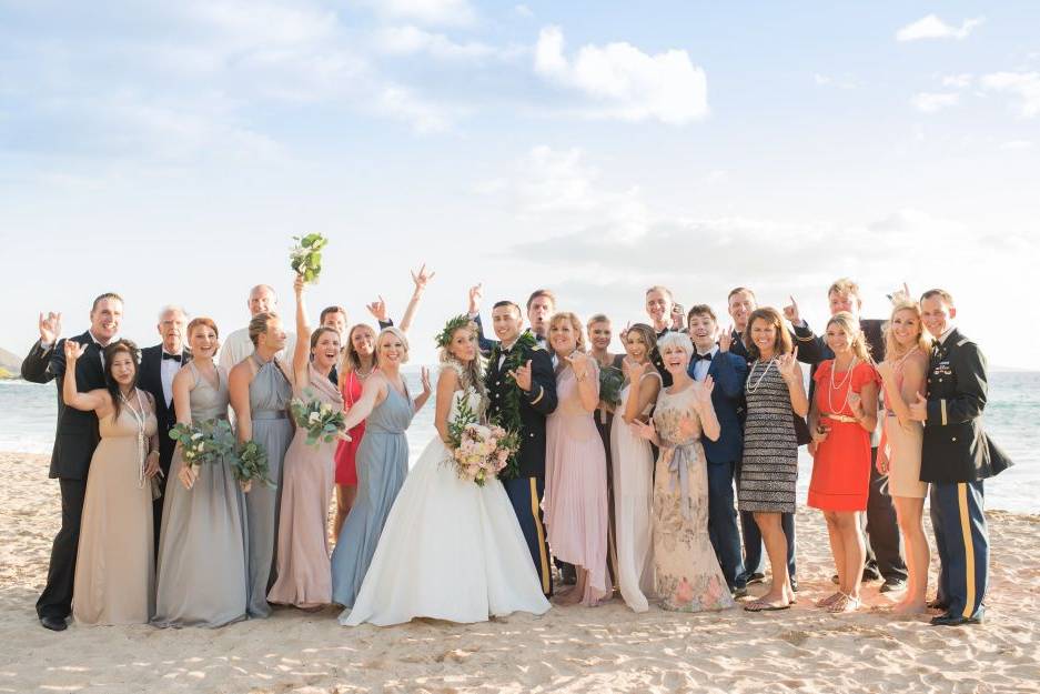 The couple with the bridesmaids and groomsmen