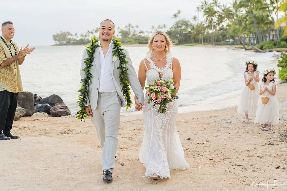Newlyweds on beach