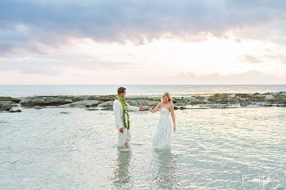 Newlyweds on beach