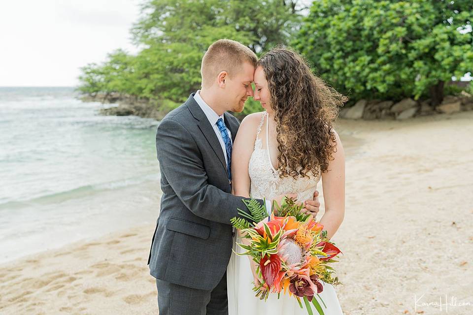 Newlyweds on beach