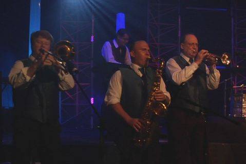 Horn section performing