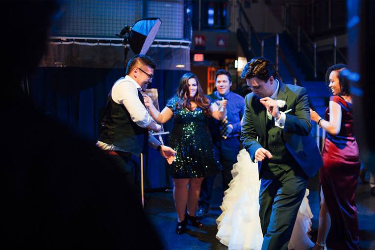 Newlywed dancing with guests
