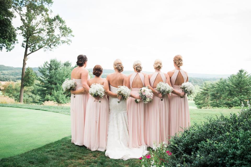 Bride with her bridesmaids