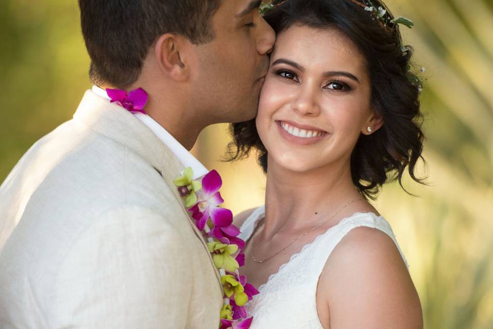 Kissing his bride