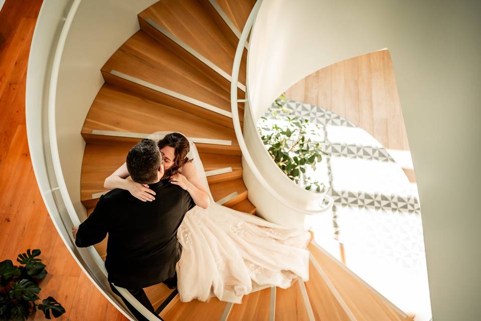 Newlyweds ascending stairs