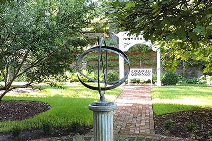 The pergola in the Orchard of the Burgwin-Wright Hosue Gardens is the most popular spot for wedding vows, but the property has endless possibilities.