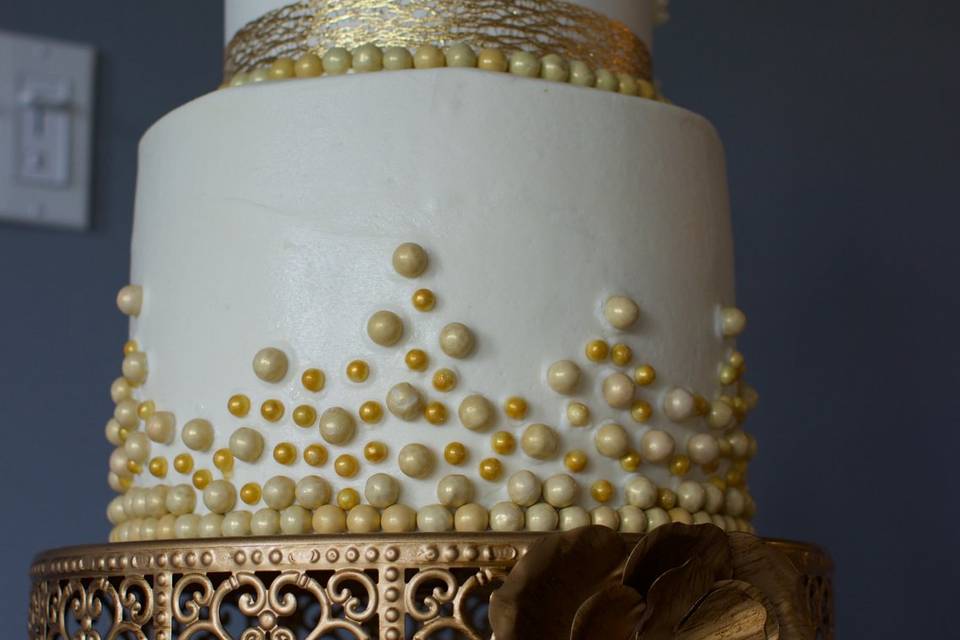 2-tier wedding cake with gold detailing