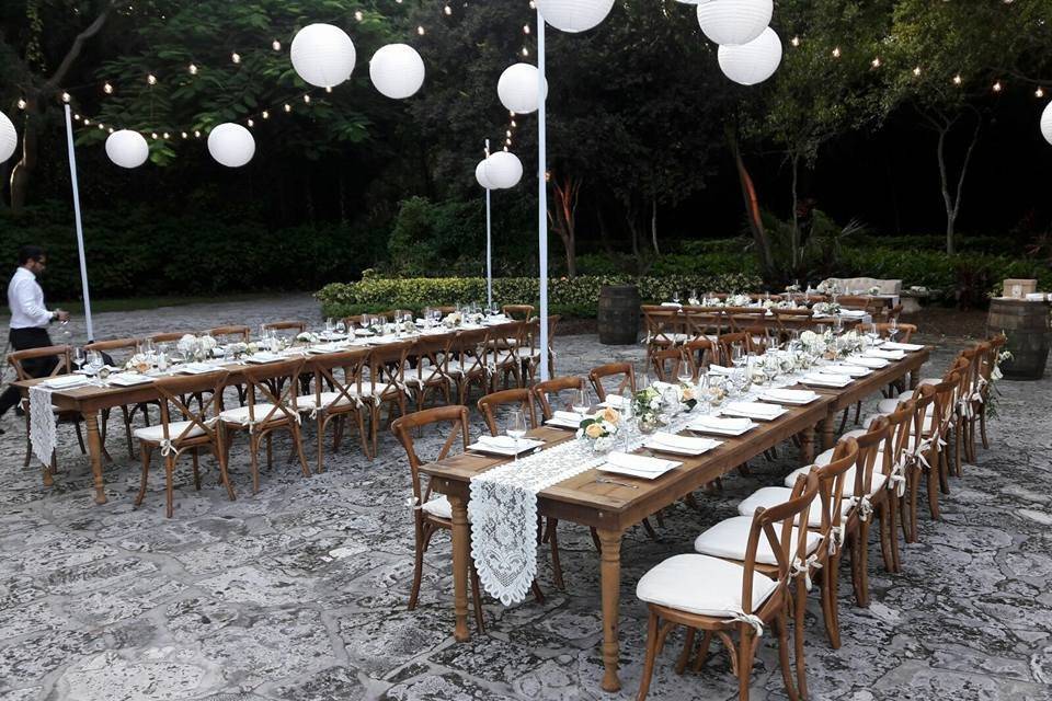Tables setup with wooden chairs