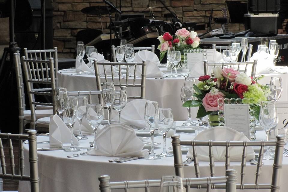 White table setting and floral centerpiece