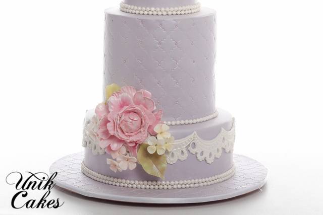 Wedding cake with pink flowers