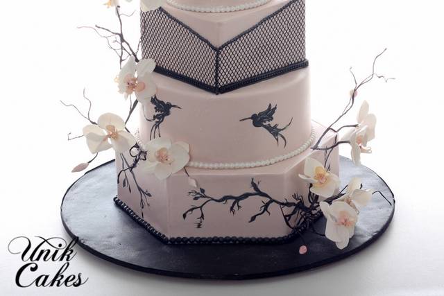 Beautiful wedding cake with white flowers