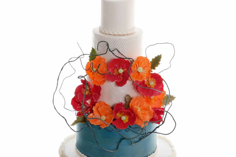 Wedding cake with red and orange flowers