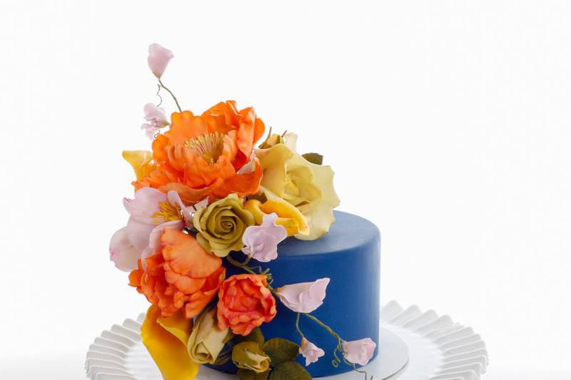 Blue cake with flowers