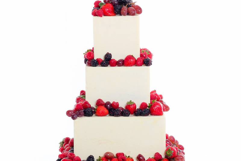 White wedding cake with berries