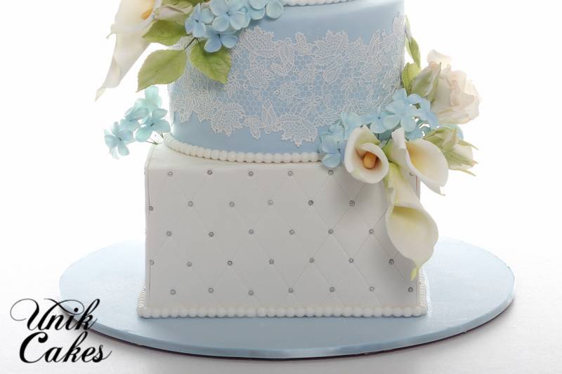 Wedding cake with a soft blue layer