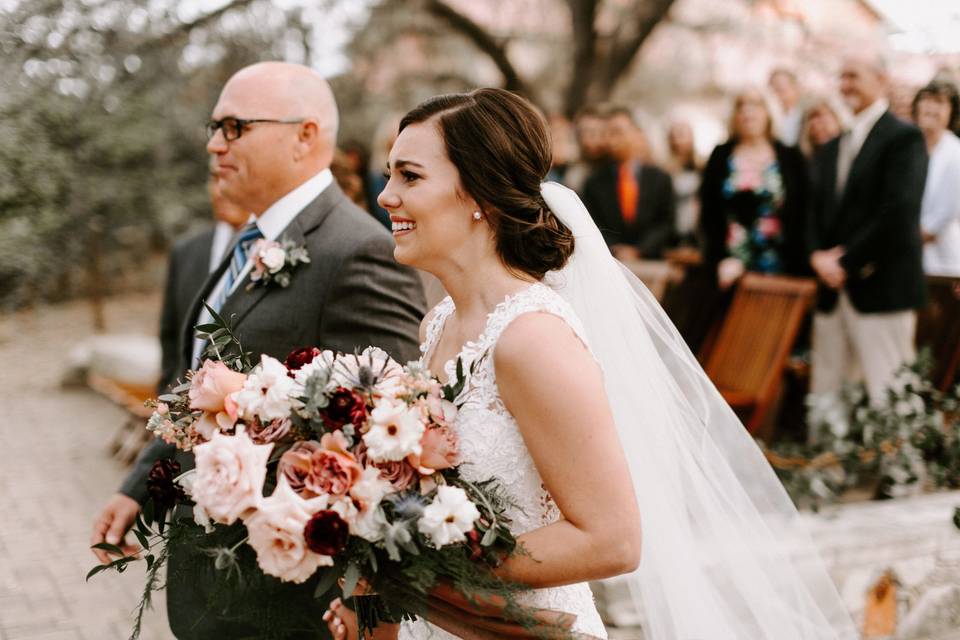 Bride walking with Dad down aisle