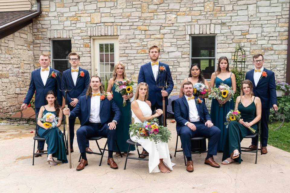 Wedding party with pitchforks