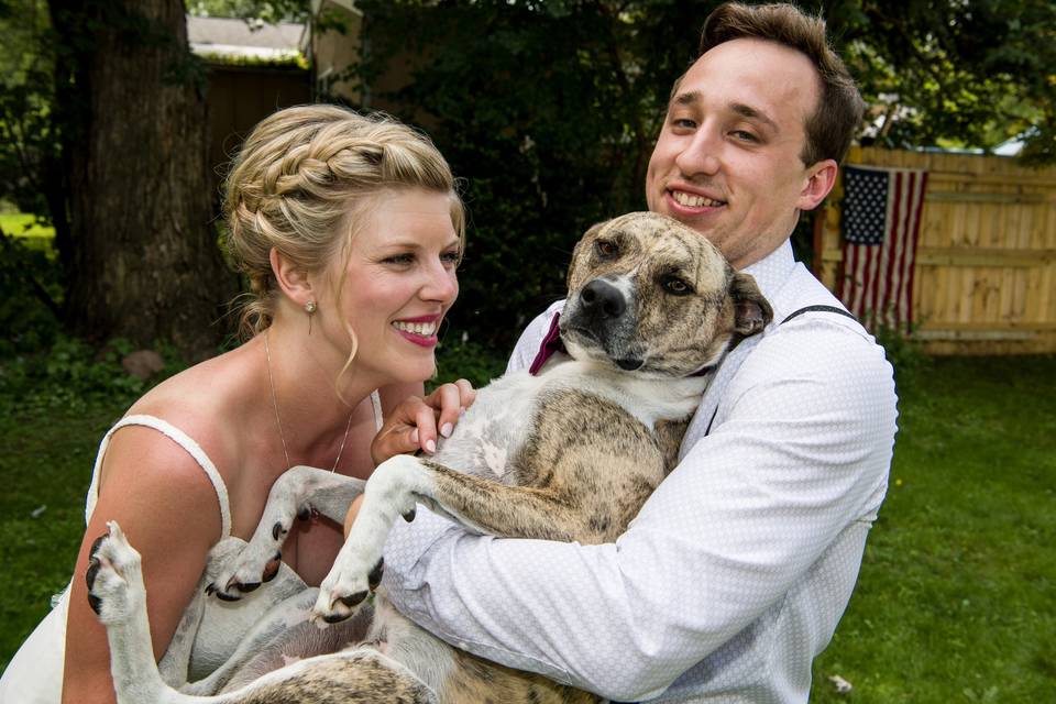 Bride and groom with dog