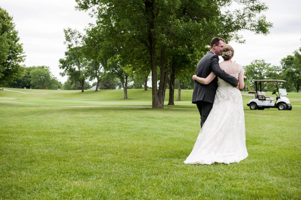 Bride and groom at golf course