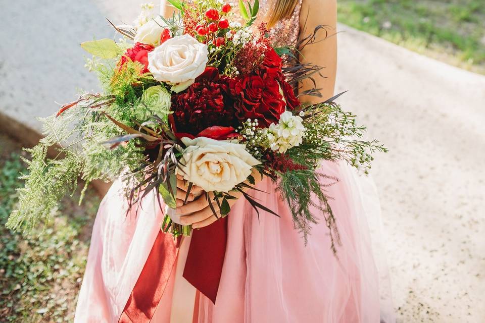 Flower girl with a flower crown and bouquet