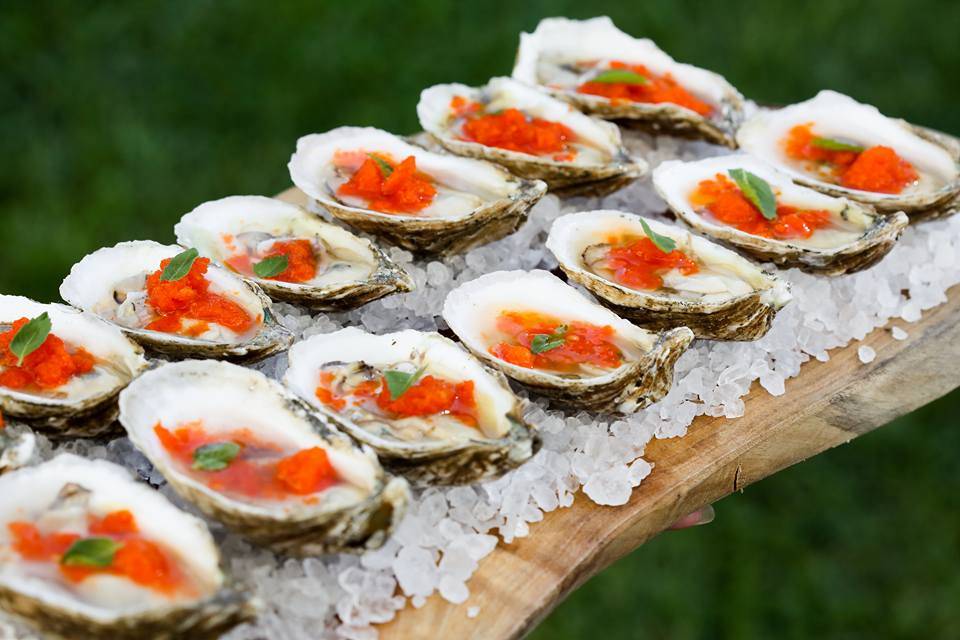 Oysters with red pepper ice