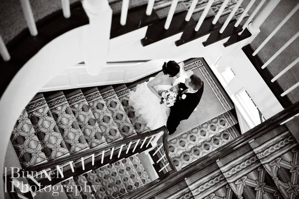 Couple's portrait on the staircase
