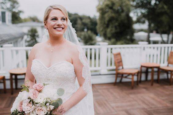 Blushing bride on the rooftop